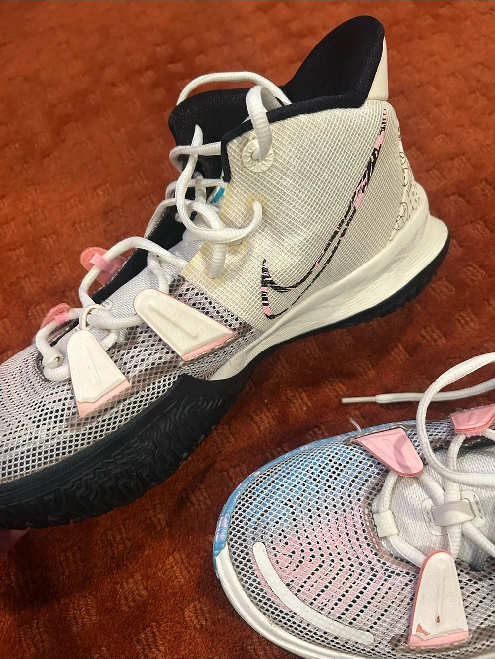 Nike Men’s  KyrieWhite Sneakers with Pink and Light Blue Accents
